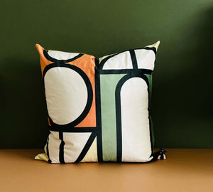 Pistachio green and burnt orange velvet 60cm x 60cm geometric decorative scatter cushion, bold shapes, plain matching background for bedroom and couch living room.