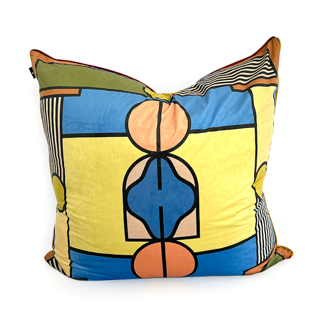 Decorative pillow with abstract geometric design on a white background