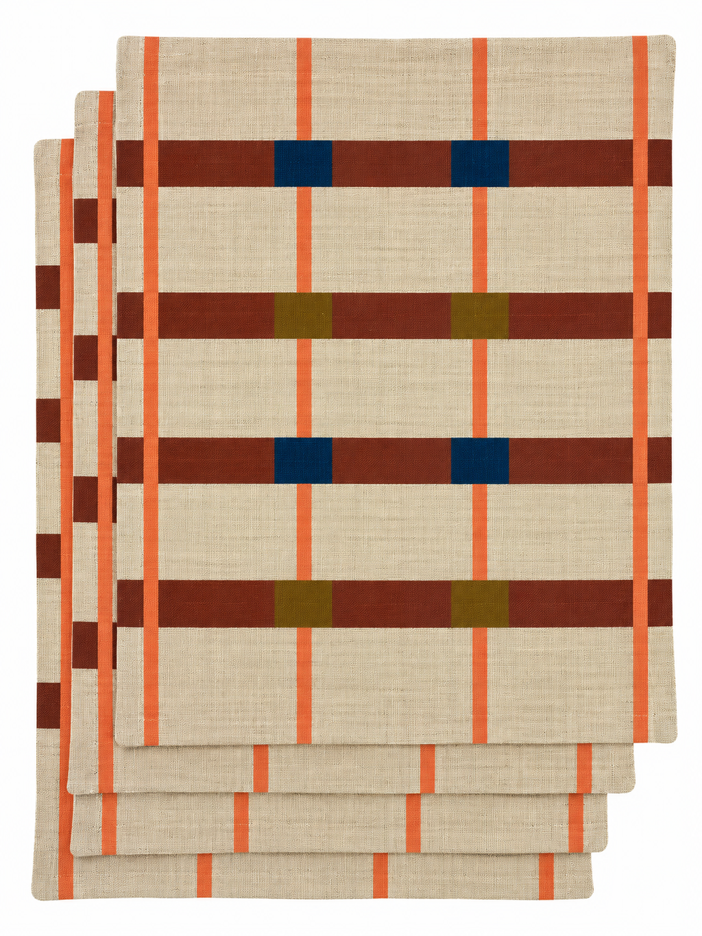 A Fields designer placemats by Lulasclan shows a set of four digitally printed linen and cotton blend placemats with a checkered pattern on a light beige background. The design features rust brown horizontal stripes, bright orange vertical stripes, and small blue and ochre square accents.