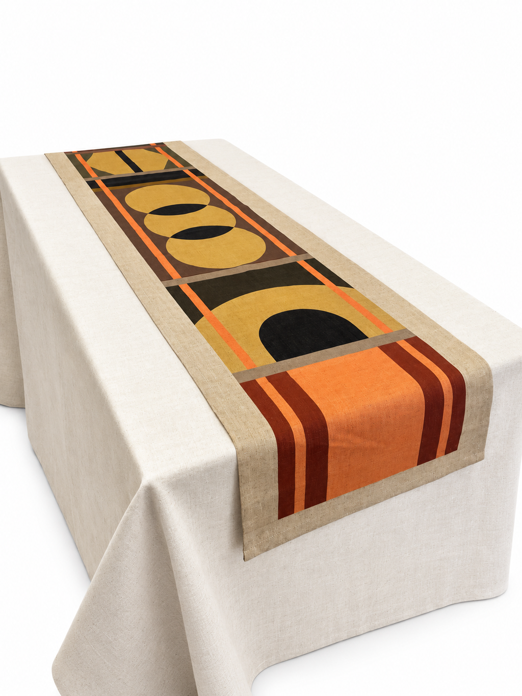 Lulasclan Designer patterned table runner with 100% Linen & cotton base features geometric symbols and motives in tan, tangerine and deep terracotta, strips cover the design's borders and is placed on a table draped with a linen off white fabric on a white background.