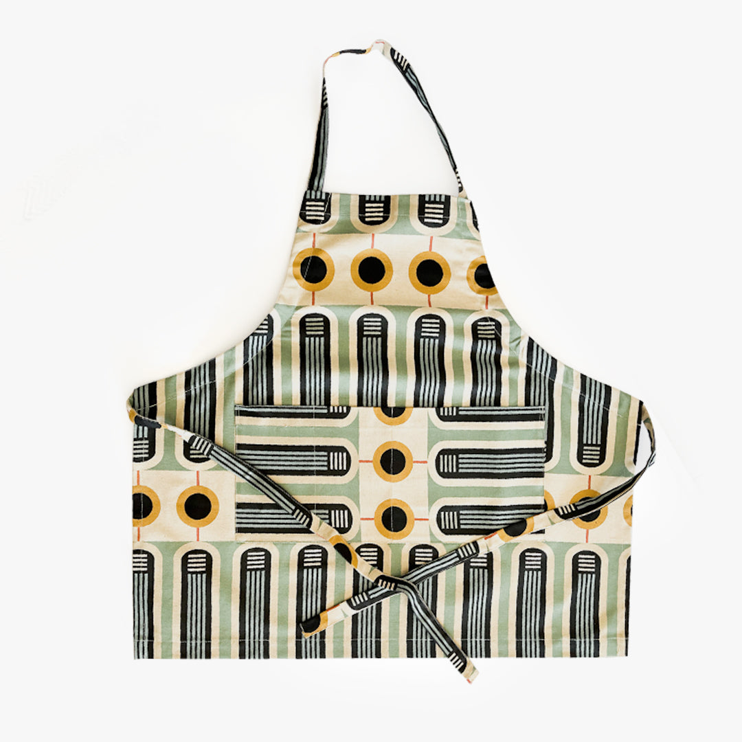 Apron in mustard mint design featuring African printed homeware fabric for contemporary kitchen Home