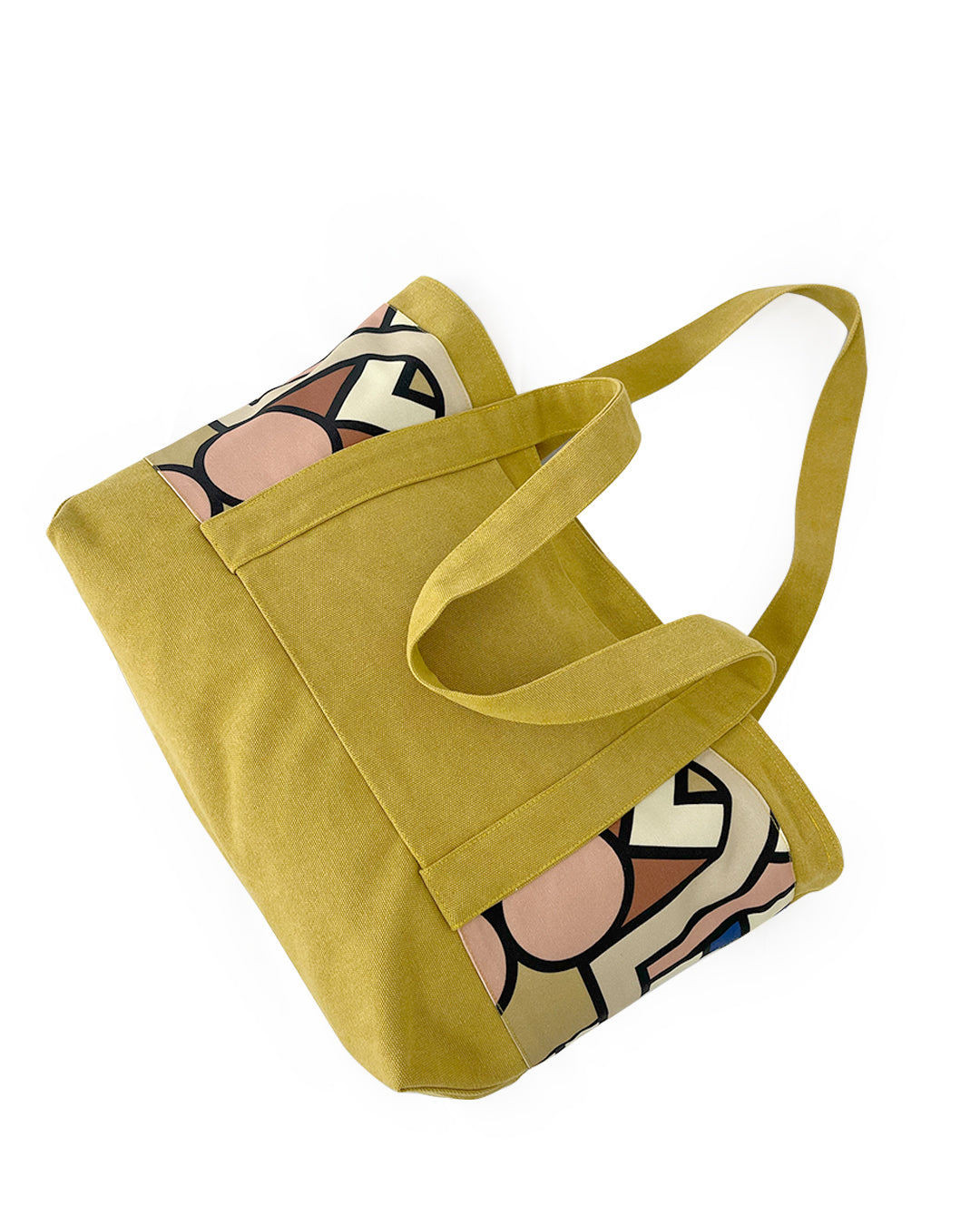 back of Yellow tote bag with abstract pattern on a white background 