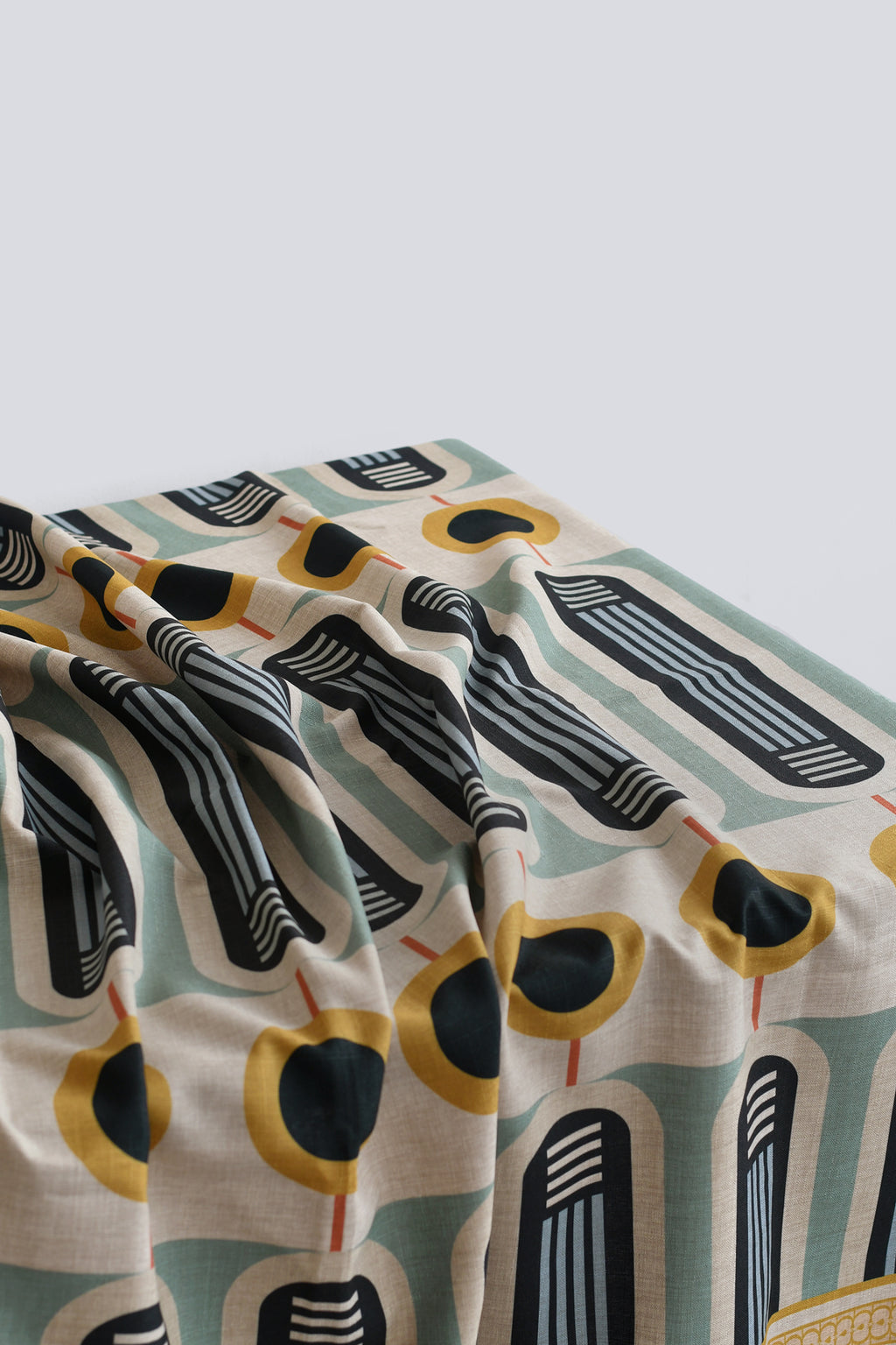 patterned linen table cloth with a closeup of the print