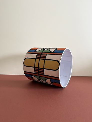 Colourful geometric drum lampshade for bedroom and living room. Lighting accessory for the home. Available in size 24cm(w)x27cm(h)